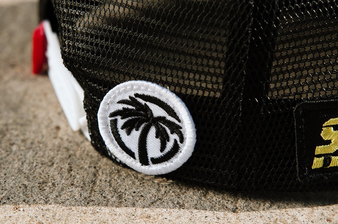 Heat Wave Little Trouble X Youth Trucker Hat